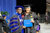Graduates with President